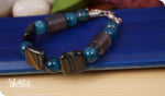 Load image into Gallery viewer, bhavaa Premium Gemstone Jewelry- Bracelet. Serene Indulgence Collection, Mark-2 | Gemstones: Grey Agate, Blue Dragon Veins Agate, Grey Hawk Eye (Tiger Eye)
