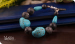 Load image into Gallery viewer, bhavaa Premium Gemstone Jewelry- Bracelet. Serene Indulgence Collection, Mark-2 | Gemstones: Blue Turquoise, Grey Larvikite Faceted, Grey Larvikite
